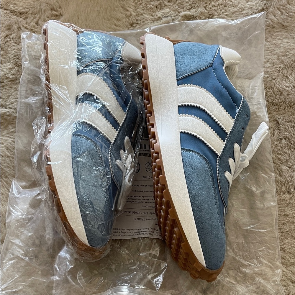 Brand New Never Worn..Light Blue Retro Runner Sneakers with White Stripes